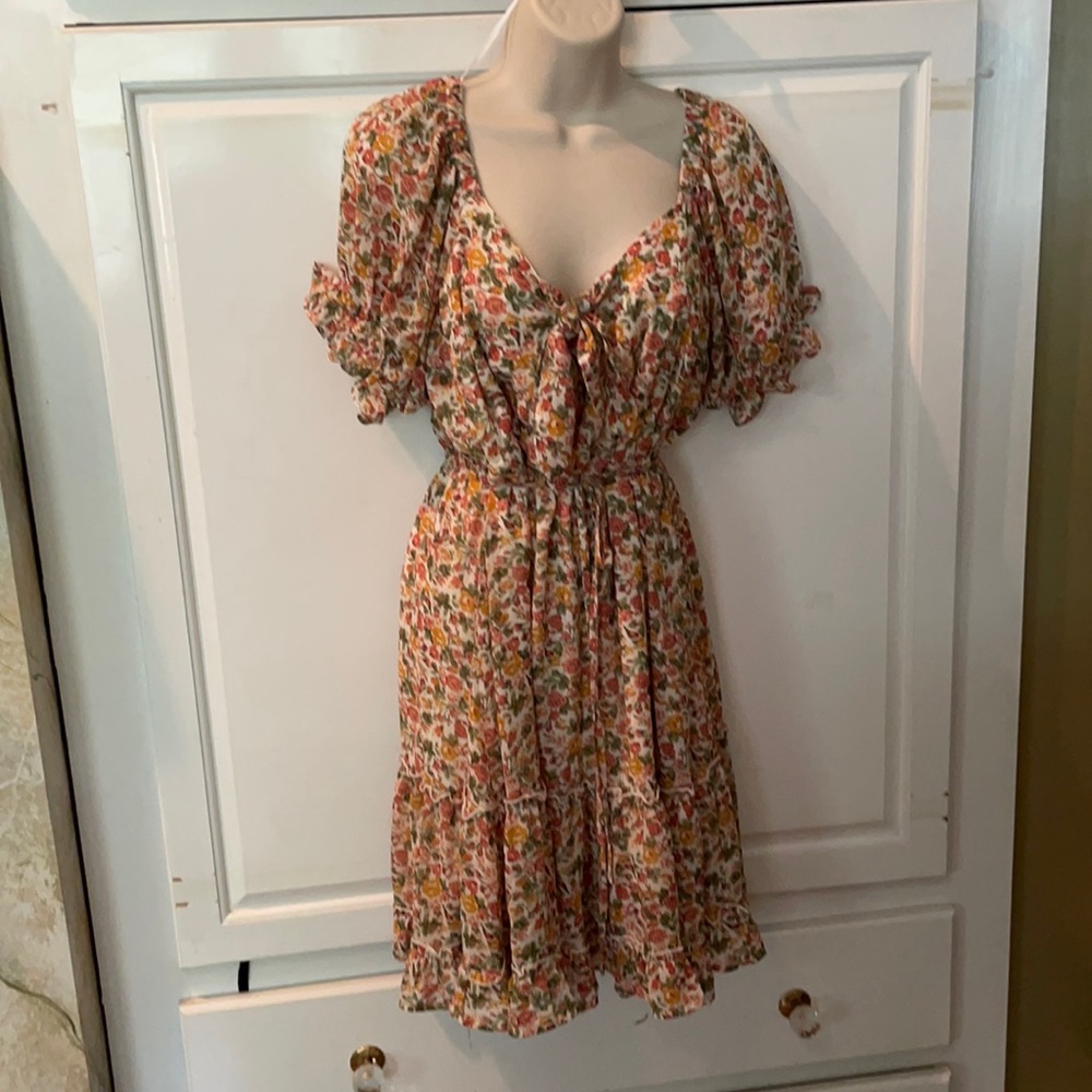 Floral dress with tie at waist.